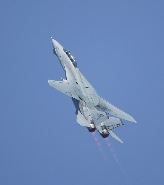 F14 Tomcat climbing steeply with afterburner