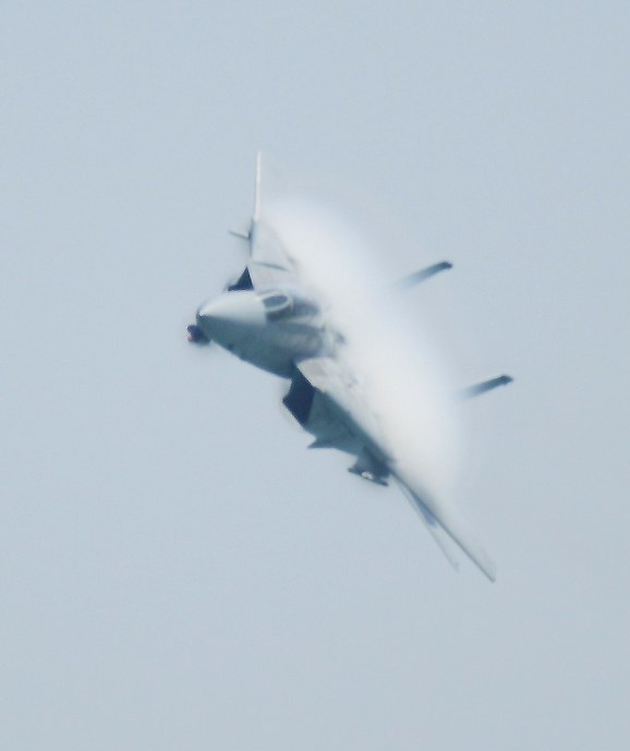 F14 Tomcat with burst of water vapor