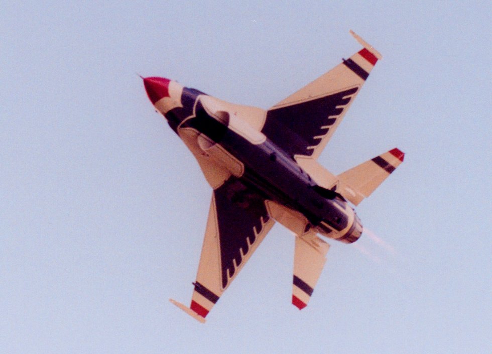 photo #3  solo Thunderbird banking hard right with afterburner operating