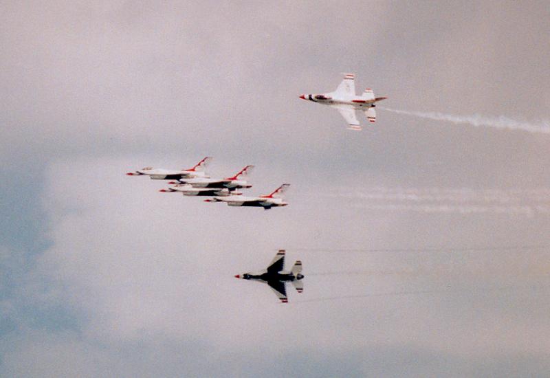 photo #404: two solo Thunderbirds breaking away from main group