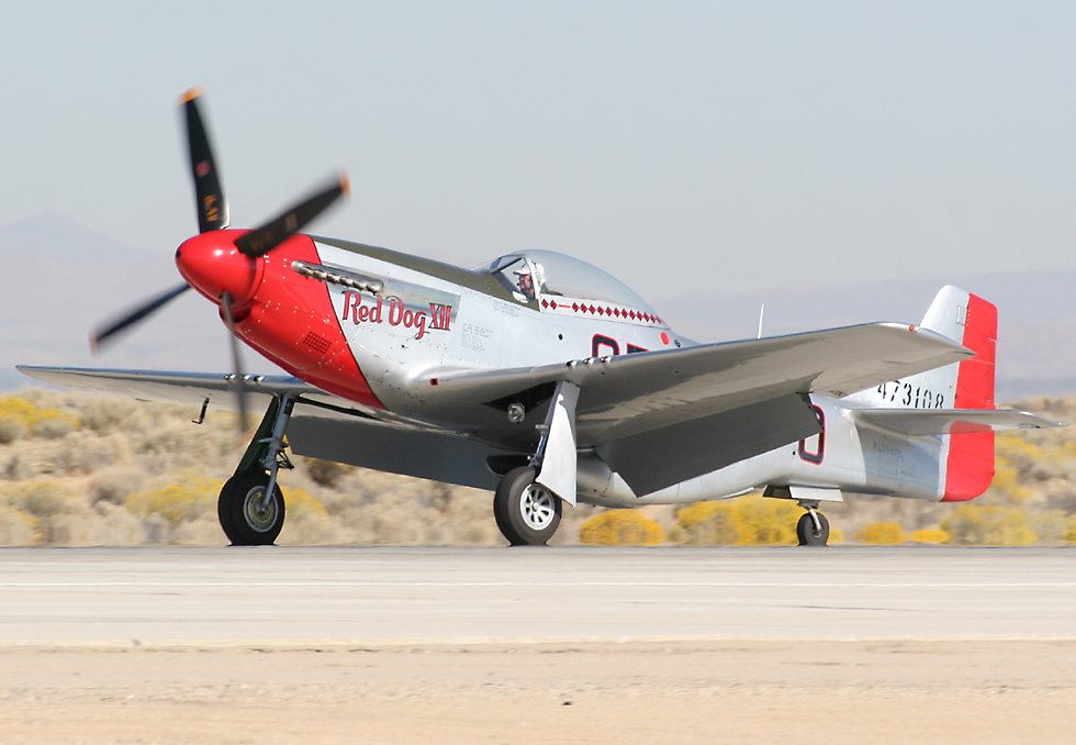 Chuck Yeager taxying a P-51D Mustang