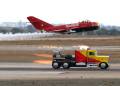 Shockwave jet powered truck 'racing' the Red Bull MiG 17