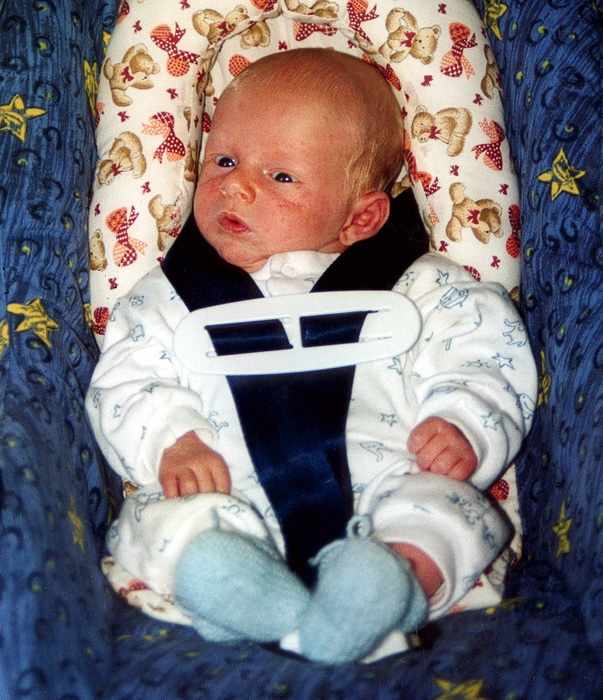 baby Charles in a bassinet