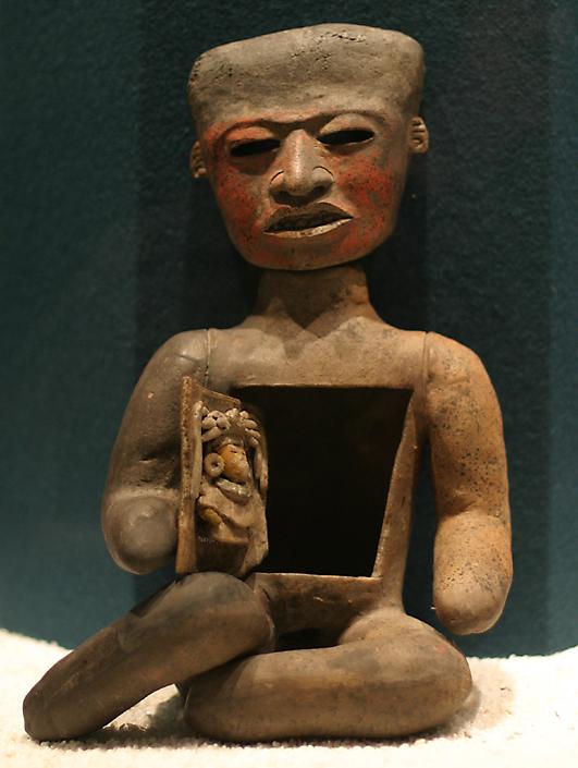 clay figure displayed at the museum