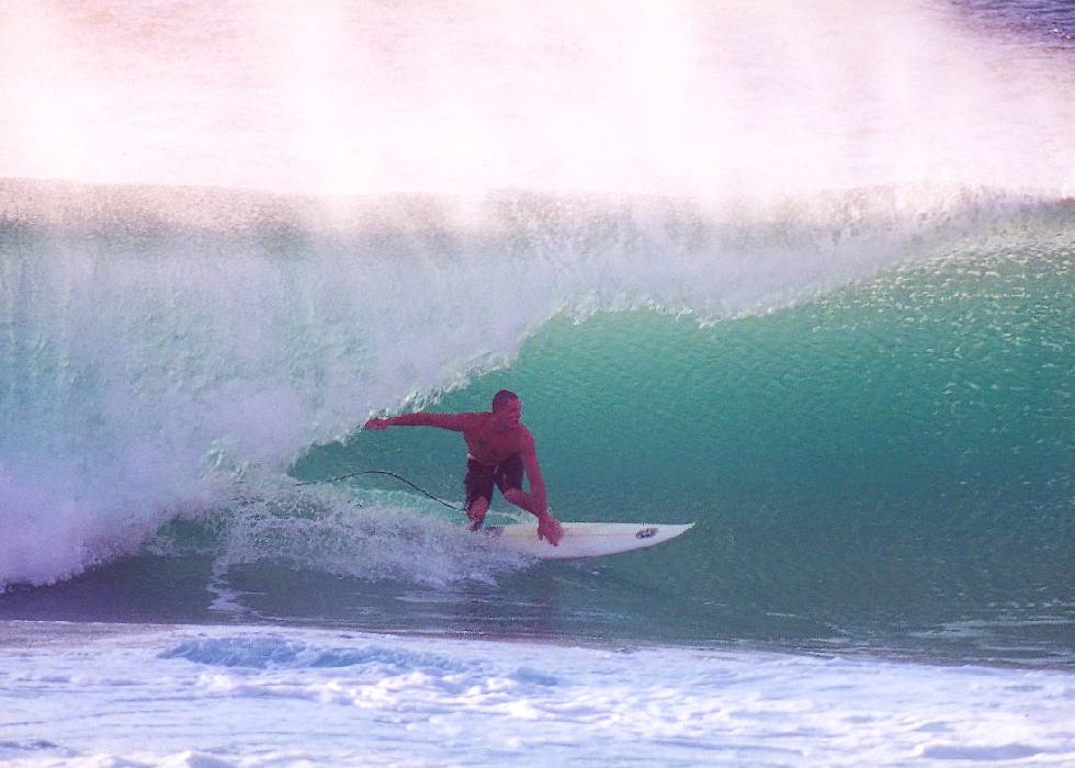 surfer in the Banzai Pipeline