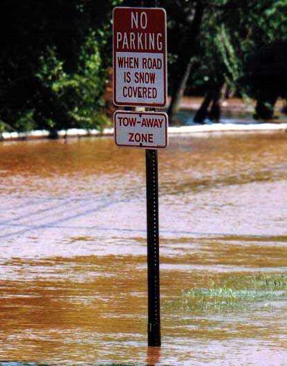 flooded No Parking When Road is Snow Covered sign