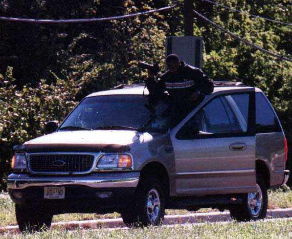 rubber necker with camera preying on people's pain and suffering