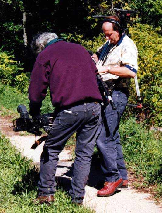TV crew setting up their camera gear.