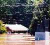 Orthodox Church statue and flooded house