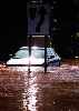 flooded car and Keep Right sign
