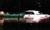 flooded convertible next to a canoe