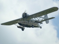 photographed at the 2003 Oshkosh AirVenture airshow using a Canon 1Ds camera and Canon 100-400mm image stabilized lens set to 400mm  (1/500th second, f6.7, ISO 100)