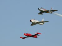 T33, Fury and F86 Sabre photographed at the Oshkosh AirVenture airshow of 2003 using a Canon 1Ds digital camera and Canon 100-400mm image stabilized lense