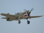 P40 Warhawk photographed at the Oshkosh AirVenture 2002 airshow using a Canon D60 digital camera and Canon 100-400mm lens