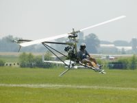 Mosquito microlight helicopter photographed at the Oshkosh AirVenture airshow 2003 using a Canon 1Ds camera and Canon 100-400mm image stabilized lens