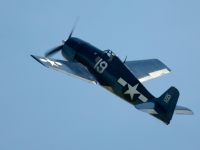 Hellcat photographed at Duxford Airshow 2002 using a Canon D60 and Canon 100-400mm lens