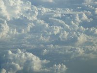 clouds over Switzerland photographed in August of 2005 using a Canon 1Ds digital camera and Canon 28-105mm lens set to 105mm  (1/180th second, f19, ISO 200)
