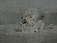 Wai-o-tapu mud pool photographed using a Canon D60 digital camera and Canon 100-400mm image stabilization lens