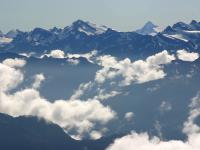 Mt Aspiring photographed from the mountains just north of Milford Sound in February of 2003 using a Canon D60 digital camera