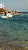 photo of Dahab with the mountains of Saudi Arabia in the background, taken in January of 2004 using a Canon 1Ds digital camera and Canon 28-105mm lens set to 73mm  (1/125th second, f6.7, ISO 100)