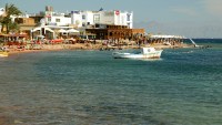 photo of Dahab with the mountains of Saudi Arabia in the background, taken in January of 2004 using a Canon 1Ds digital camera and Canon 28-105mm lens set to 73mm  (1/125th second, f6.7, ISO 100)