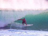 Oahu, Hawaii:  surfer inside the Banzai Pipeline