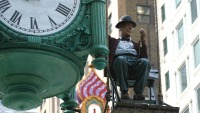 Marshall Field's Department Store clock photographed in October of 2002 using a Canon D60 camera and Canon 100-400mm image-stabilized lens set to 100mm  (1/250th second, f4.5, ISO 100)
