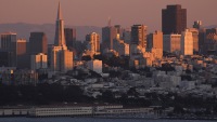San Francisco at dusk photographed in December of 2011 using a Canon 5D camera and Canon 100-400mm image stabilized lens set to 235mm (1/350th second, f4.5, ISO 200)