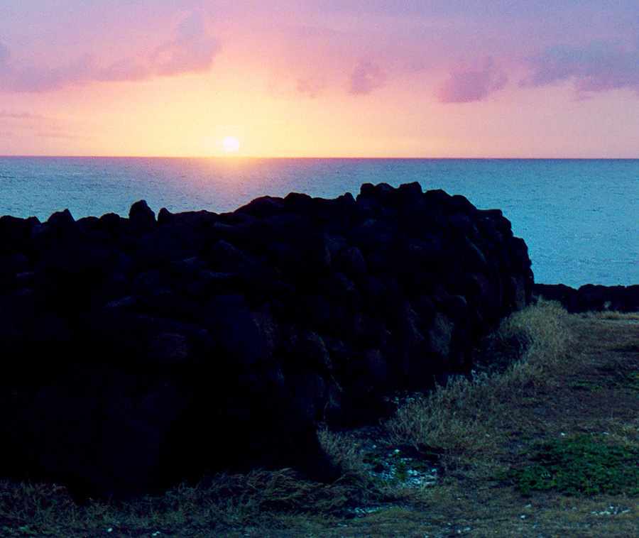 sunset over Ka Lae heiau